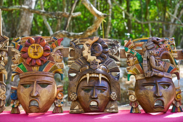 istock Chichen itza Mayan handcrafts wood masks 911656612