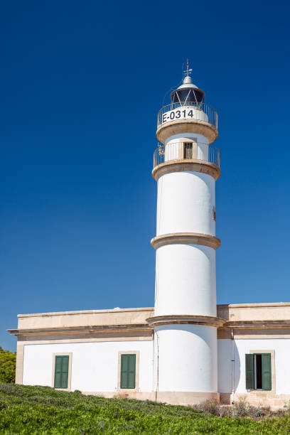 istock Lighthouse at Cap de Ses Salines. Mallorca island, Spain.This lighthouse is located at the southernmost point of Mallorca. 911656970