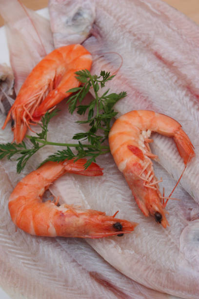 istock Sole sea fish  Preparation in the kitchen before cooking 911664096
