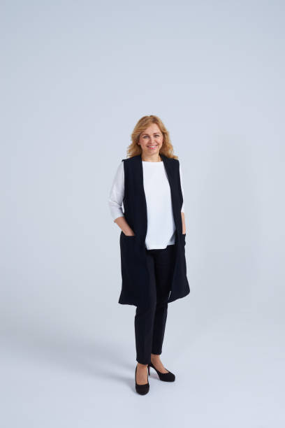 istock Mature blond woman in studio 911668626