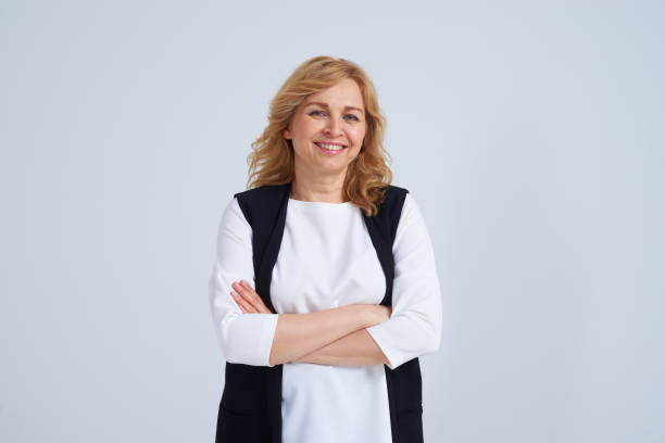 istock Perfect mature blond smiling with folded arms 911668748