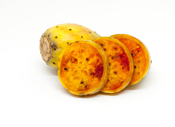 istock whole and sliced ripe cactus fruits over white background 911671722