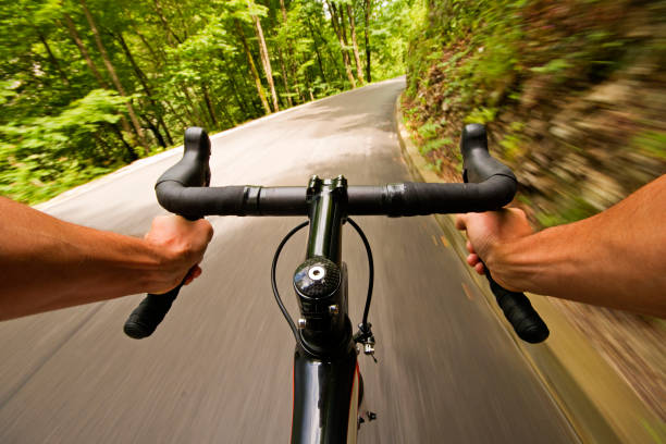 istock Cyclist riding a bike 911671780