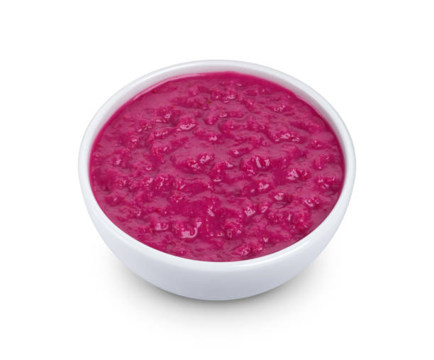 istock Red horseradish sauce with beet isolated on white background 911674656