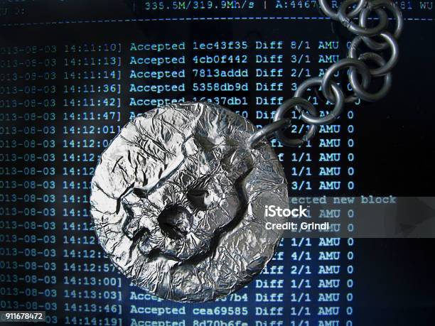 Bitcoin Chain Real Coin Of Crypto Currency Joined By Metal Chain Is On A Mining Computer Screen Stock Photo - Download Image Now