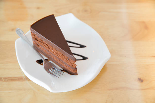 istock Delicious chocolate cake on plate 911678478