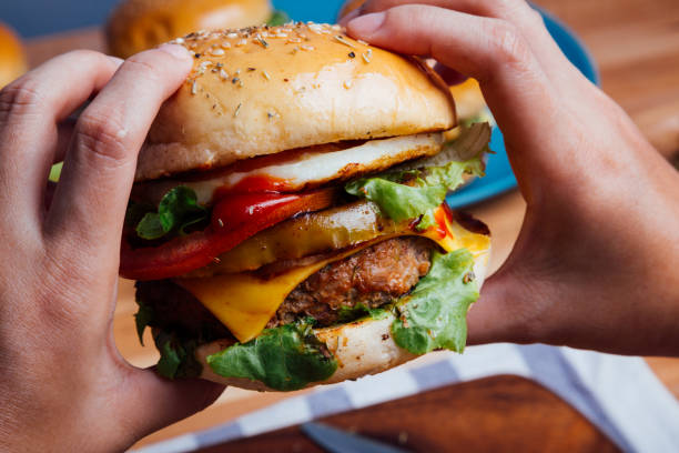 istock Homemade hamburger with fresh vegetables for everyone 911687076