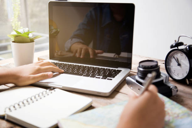 Business woman working on laptop at workplace