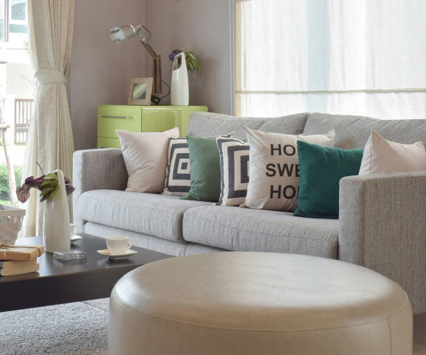 istock Rounded shape stool with a cozy sofa in modern living room 911690368