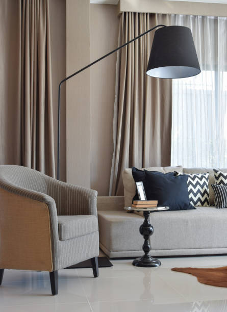 istock stylish living room design with grey striped pillows on comfortable sofa 911690572