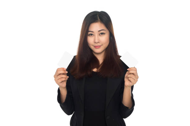 istock business woman hold card on white background 911694162