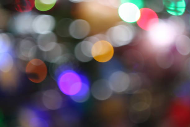 istock Christmas tree out of focus background 911698692