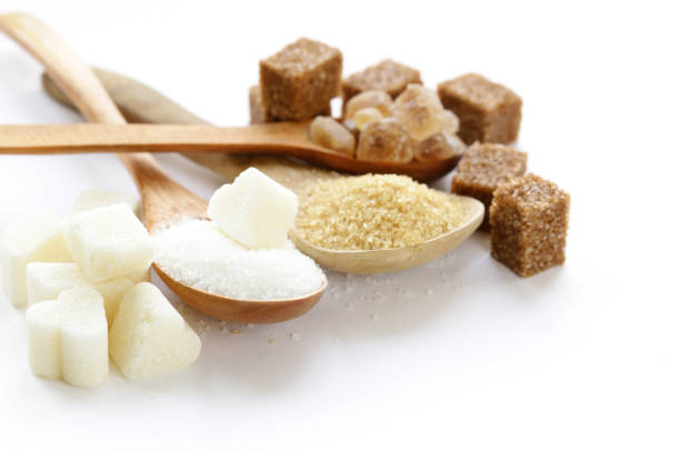 istock white and brown sugar sand and refined sugar 911702778