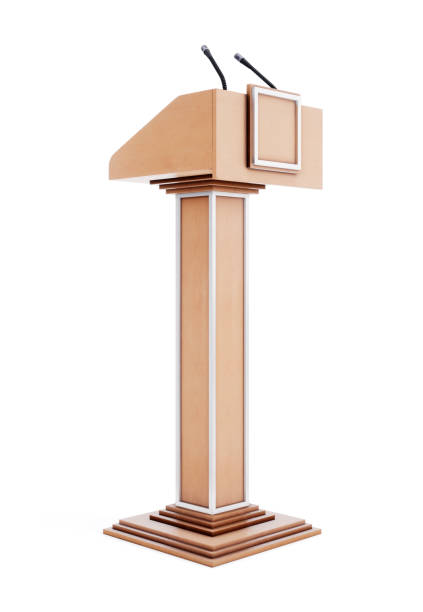 istock Tribune with microphones for speaking, reading lectures. Rostrum for the performance. Podium.3d rendering 911706430