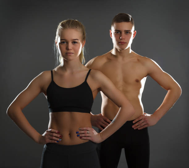 istock Female and male athletes. 911706622