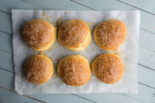 istock Homemade burger bun on parchment 911709134