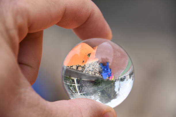 istock Colorful benches lined up Through a crystal ball 911721150