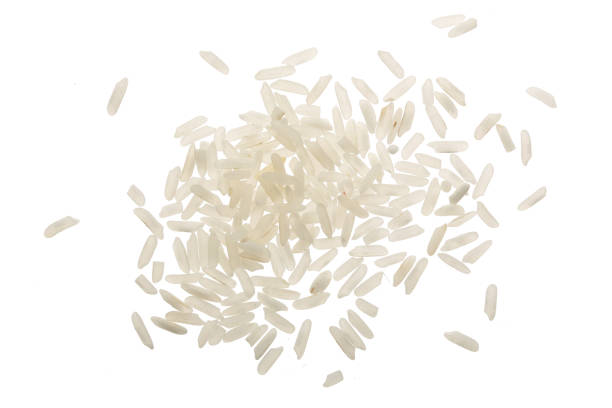 istock rice grains isolated on white background. Top view. Flat lay 911721178