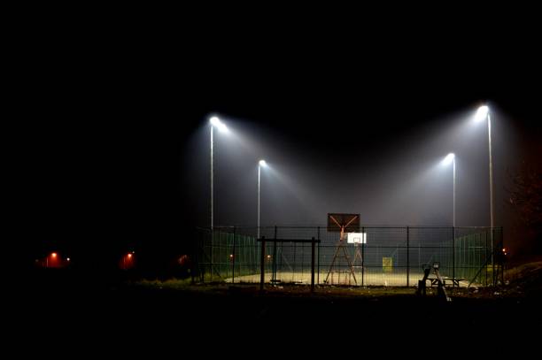 istock illuminated basketball court 911724646