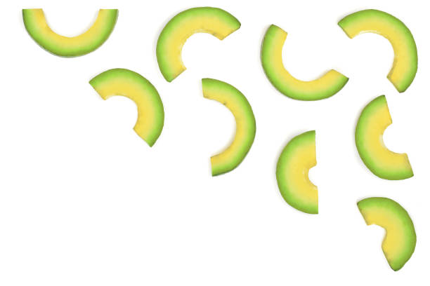 istock slices of avocado isolated on white background with copy space for your text. Top view. Flat lay 911728372
