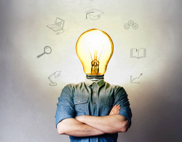 Concept of a new idea. Concept of a new idea. A man with an incandescent lamp instead of a head. resourceful stock pictures, royalty-free photos & images