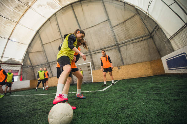istock Soccer Players On A Playing Field 911735136