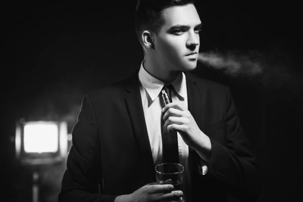 istock successful man enjoying life smoking drink 911739006