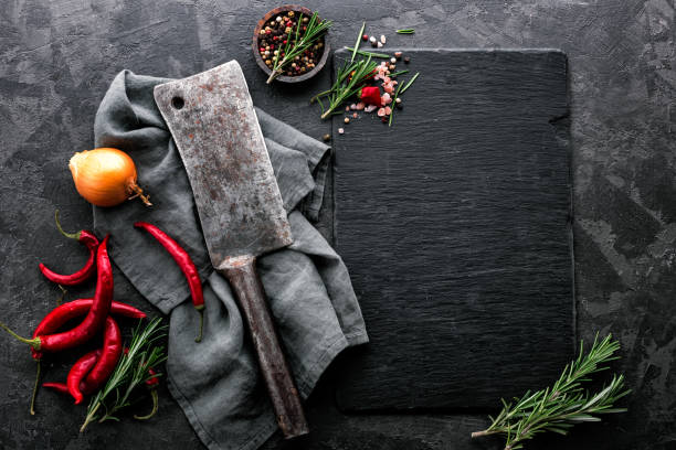 istock dark culinary background with empty black slate board and space for text recipe or meat menu 911742688