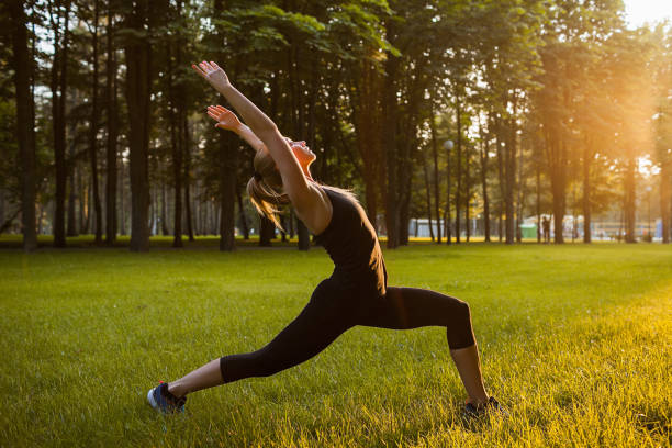 istock yoga open air inner harmony sport background 911743102
