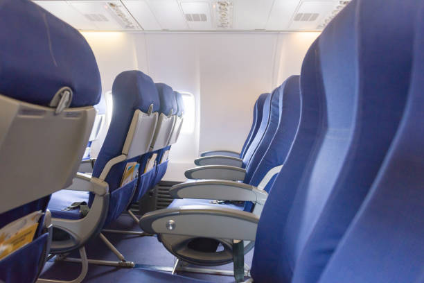 istock Empty airplane seats in the cabin 911747282