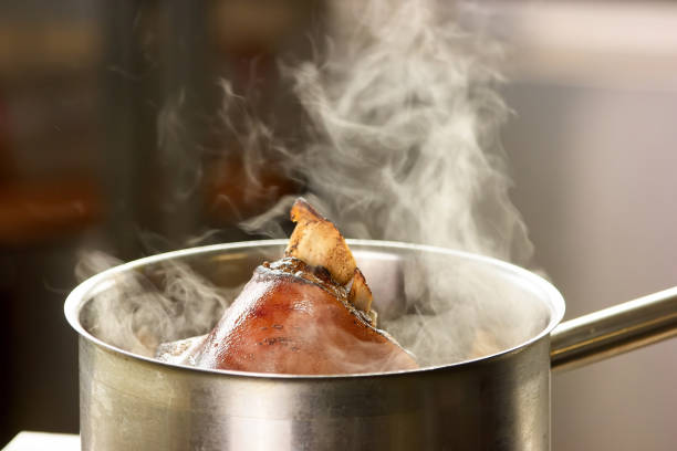 istock Evaporation from water with pork knuclke. 911747336