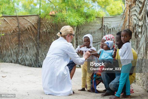 Medical Exam Of African Family Stock Photo - Download Image Now - Africa, Doctor, Healthcare And Medicine