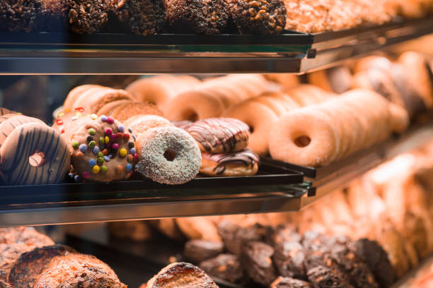 istock Different sorts of donats on breakfast in cafe 911758250