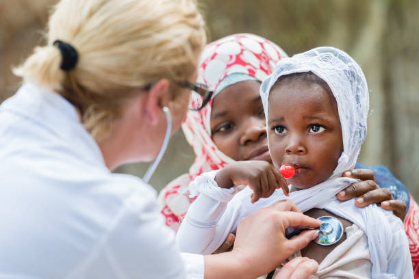 Stethoscope exam of African child stock photo