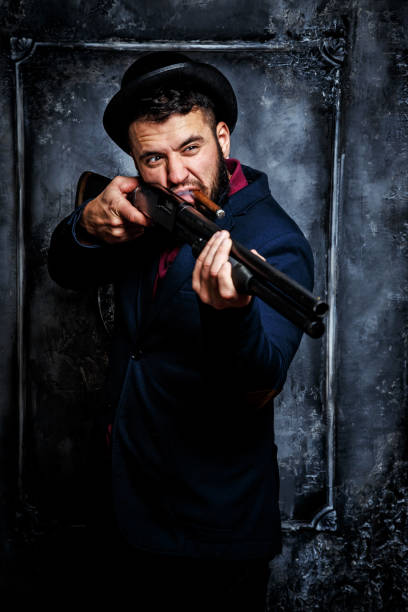 istock Powerful businessman with a gun 911758408