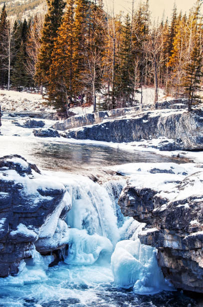 istock Partly frozen Elbow Falls near Bragg Creek,Alberta,Canada 911758652