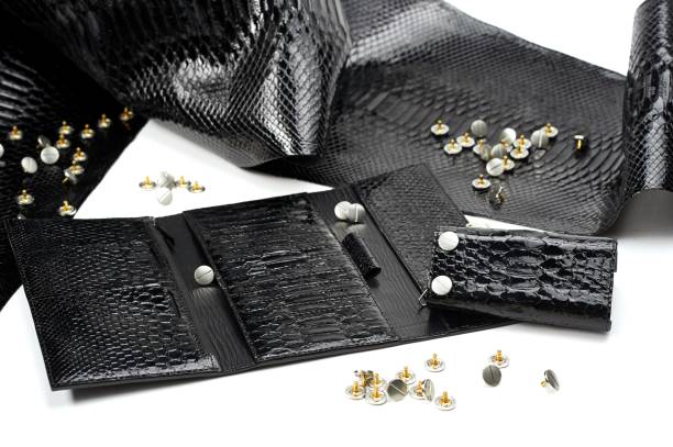istock Black glancy pieces of leather 911758938