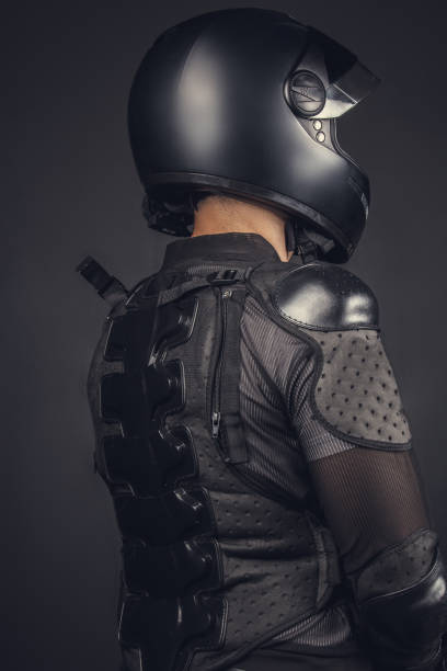 istock Biker in helmet and protection on his back. 911765280