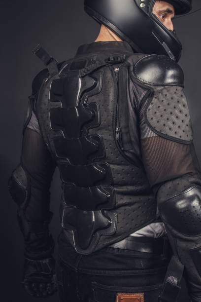 istock Biker in helmet and protection on his back. 911768812