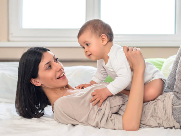istock Happy mother with baby 911769250