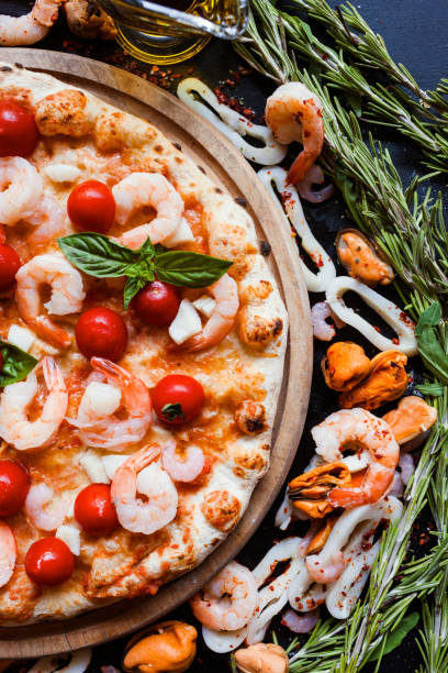 istock seafood pizza tomato shrimp mediterranean food 911769442