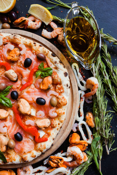 istock mediterranean pizza seafood olive homemade recipe 911769534