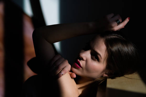 istock Beautiful young woman posing in natural lighting 911769764