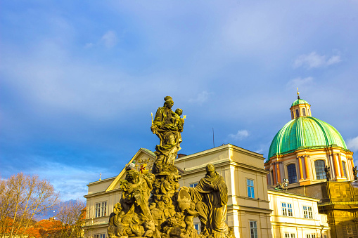 Prague, Czech Republic - December 31, 2017: Statues of Madonna and Saint Bernard, outdoor sculptures on the north side of Charles Bridge.