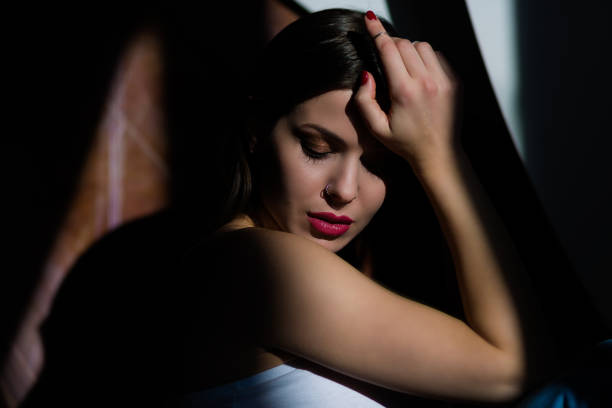 istock Young woman posing in a natural lighting 911770748