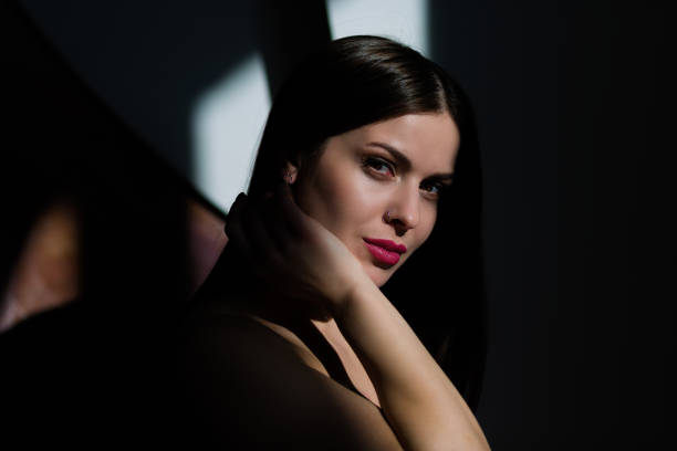 istock Young woman posing in a natural lighting 911771098