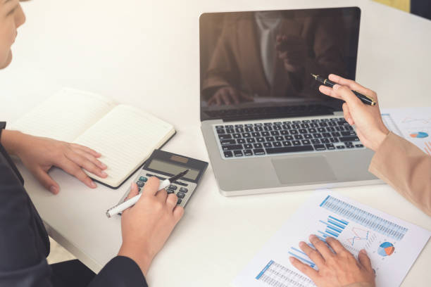 istock Business team meeting working with new startup project, discussion and analysis data the charts and graphs, calculator, laptop computer using, Business finances and accounting concept 911773586