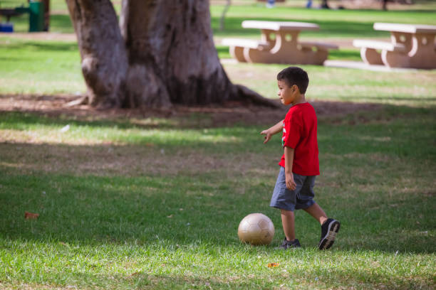 istock Toddler at park playing 911782248