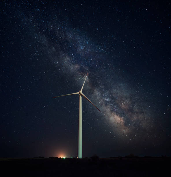 istock Wind Turbine Under The Stars 911787728