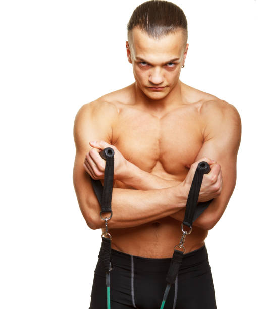 istock Fitness man doing exercises with expander 911801742